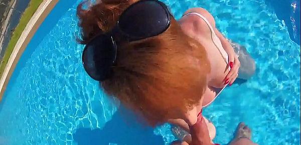  British Mature Red XXX sucking cock in a pool